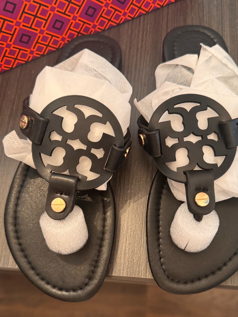 Brand New-never worn 
Tory Burch Black Leather Logo Sandals